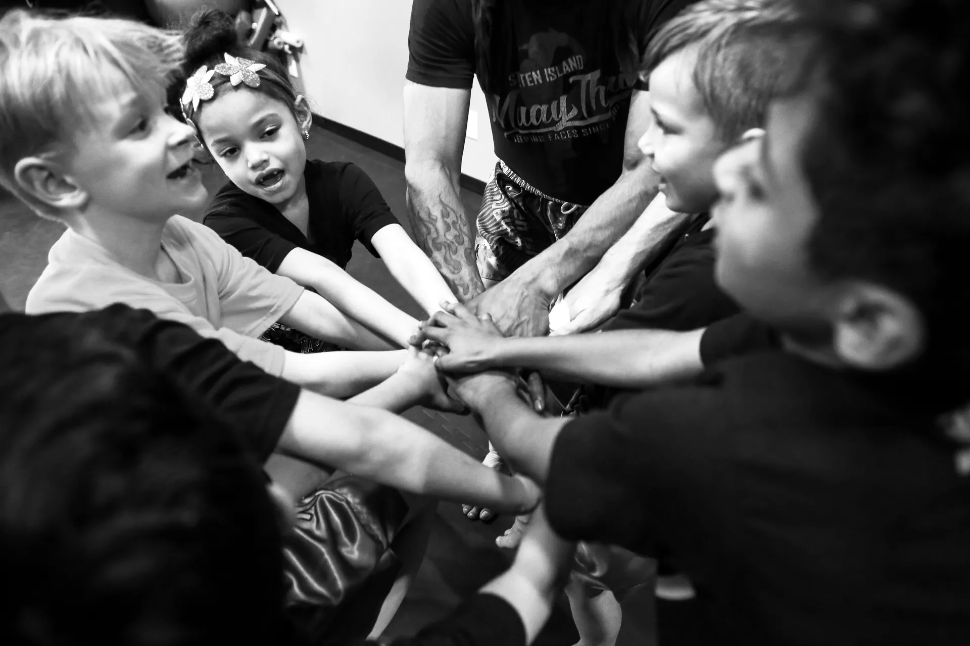 Teen martial arts training session showing proper Muay Thai technique